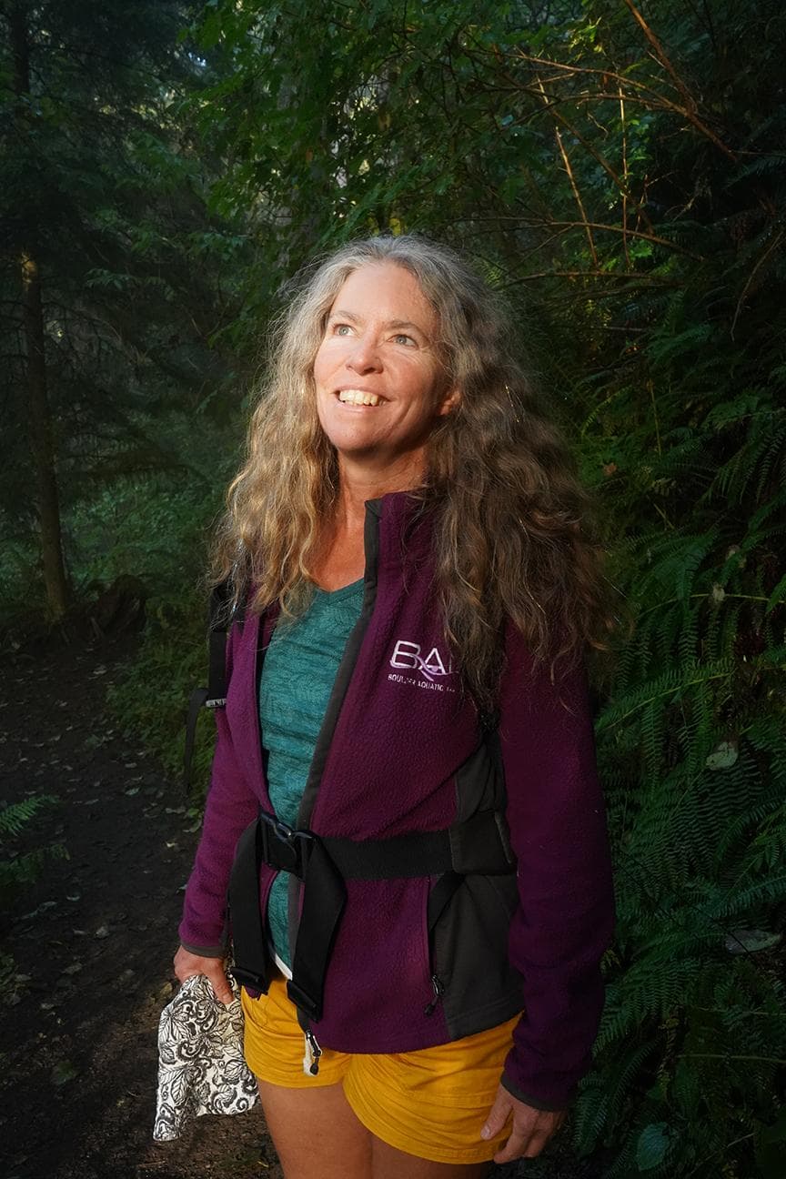 Rhianna smiling among ferns at Cape Lookout, Oregon
